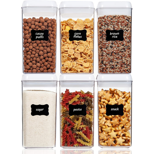 Storage containers filled with dry goods like pasta and cereal