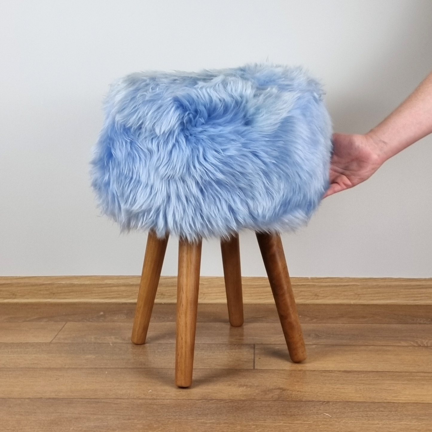 Sky blue genuine sheepskin stool with oak legs