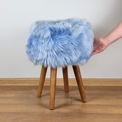 Sky blue genuine sheepskin stool with oak legs