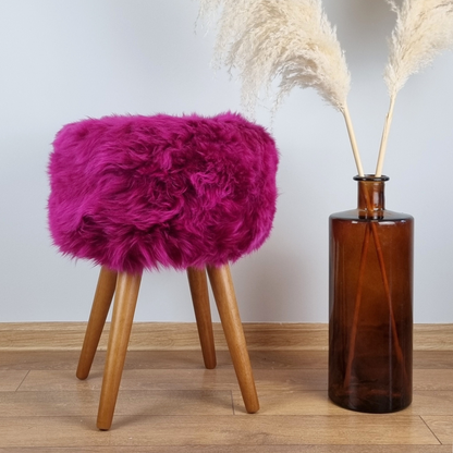 Pink genuine sheepskin stool with oak legs