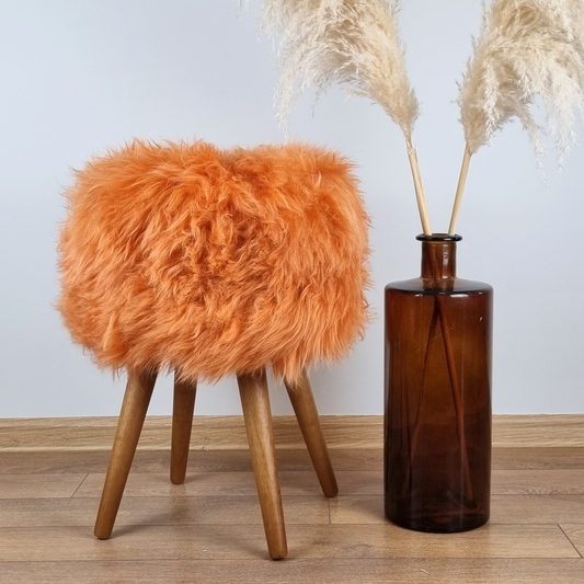 Orange genuine sheepskin stool with oak legs