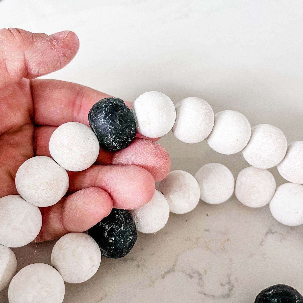 Whitewashed Wood Bead Garland with Jumbo Black Recycled Glass Beads