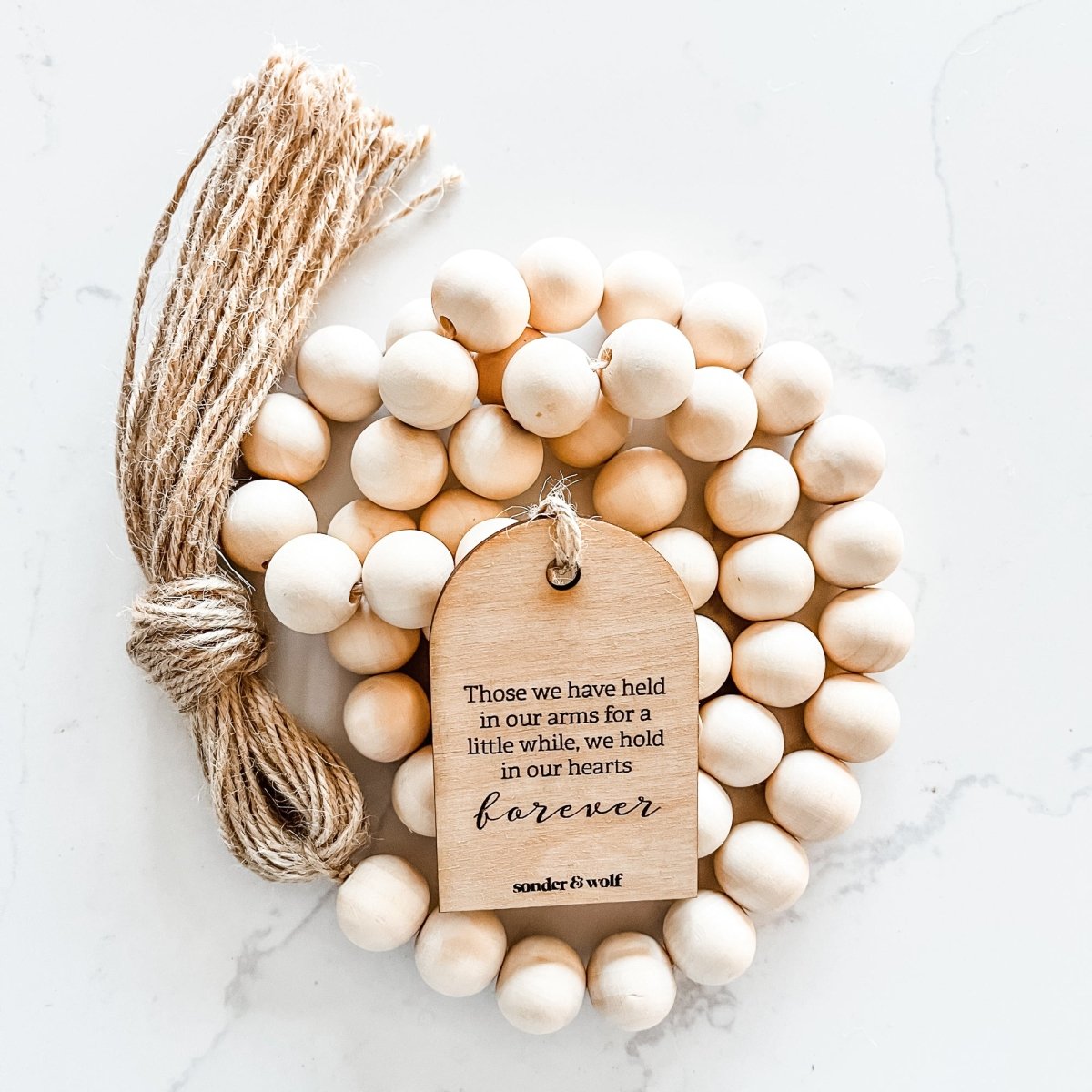 Wood Bead Garland with those we have held in our hearts tag