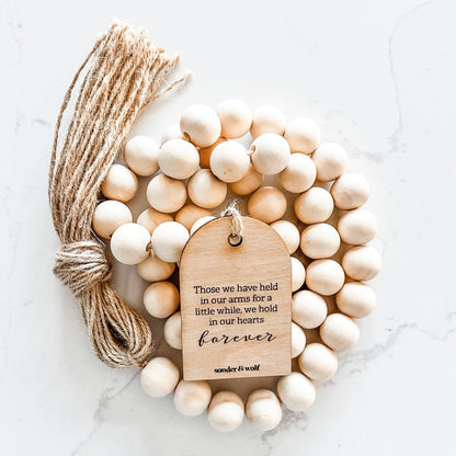 Wood Bead Garland with those we have held in our hearts tag