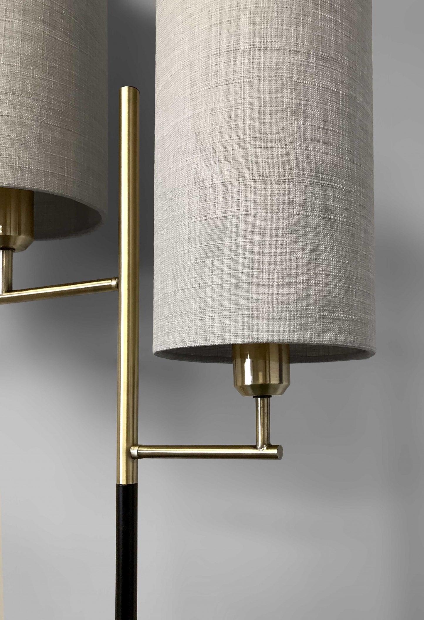 70" Brass Two Light Novelty Floor Lamp With White Drum Shade